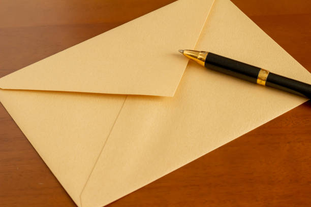 istock Envelopes and ballpoint pens for sending letters 1292532957