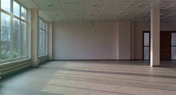 istock Plastic windows and pink walls in a renovated office  space 1292538790