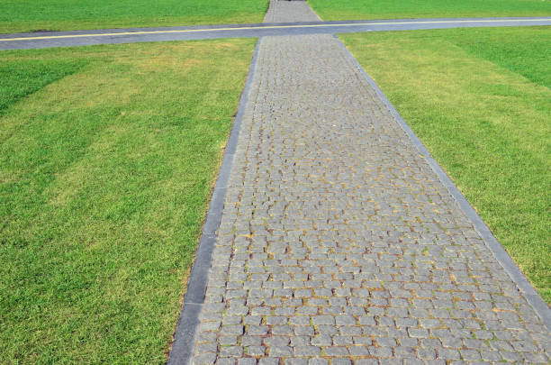 istock Intersecting stone walkways in the city  park 1292539416