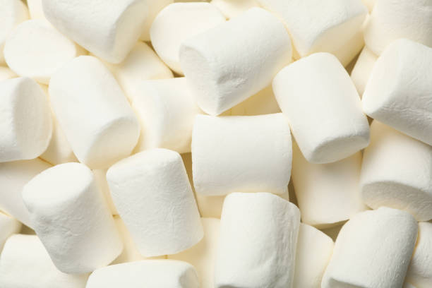 istock Sweet marshmallow on whole background, close up 1292541225