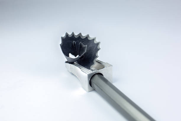 istock Sharpener and a broken pencil. Shavings and a graphite on white background. Close up photo. 1292541255