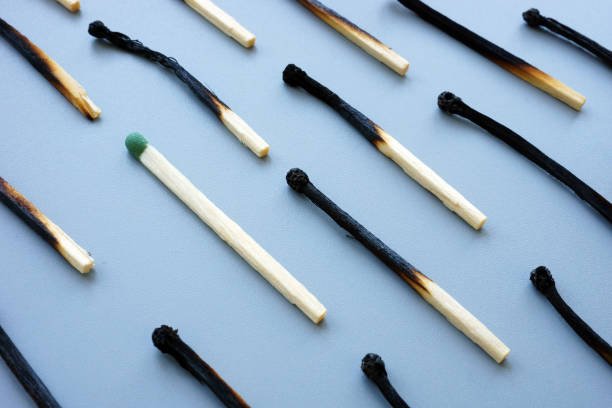 istock Burnout at work. Burnt matches and one whole. 1292546666