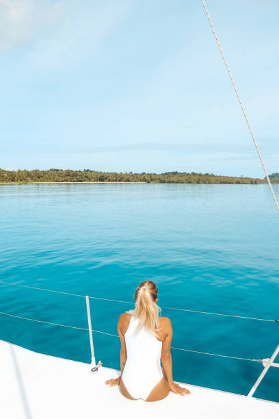 istock Girl sunbathing on the boat 1292548432