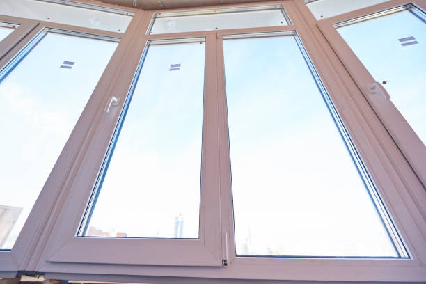 istock Installation of new plastic windows in housing renovation. 1292553345