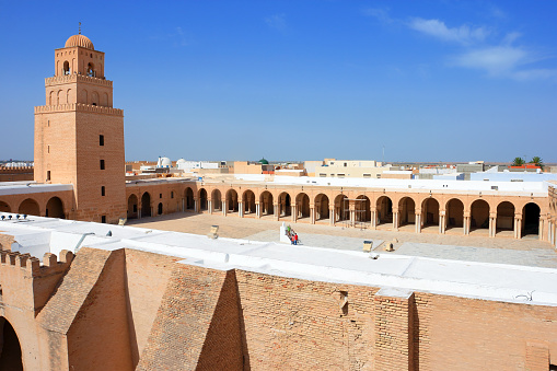 Tunisia - Kairouan - The panoramic view of fortress-like Great Mosque aka the Mosque of Sidi-Uqba and its minaret (built 9th century) are listed as UNESCO World Heritage and is one of the most impressive and largest Islamic monuments in North Africa