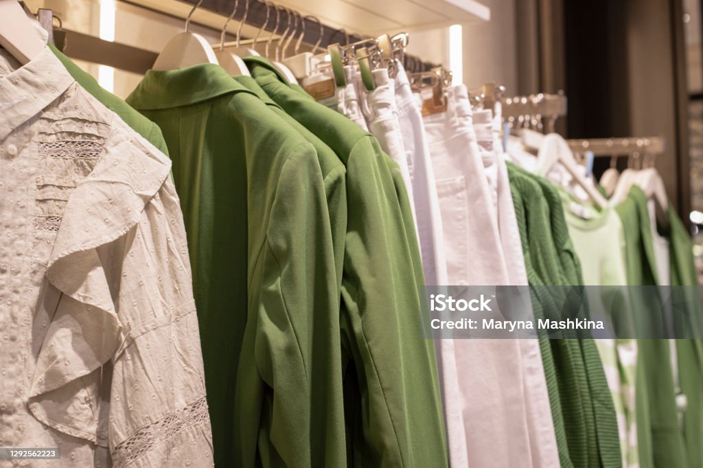 Women clothing collection on hangers in the store. the concept of conscious consumption and recycling of things Women clothing collection on hangers in the store. the concept of conscious consumption and recycling of things. Sustainable Fashion Stock Photo
