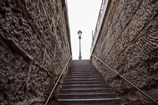 Empty vintage staircase in Paris, France, no people and tourists.