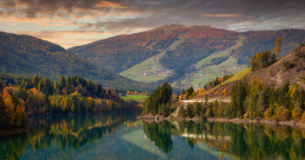 istock Idyllic lake scenery in Alps mountains 1292563341
