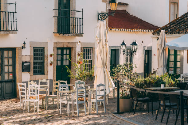 Cafe in the old town, Faro, Portugal Faro, Algarve, Portugal, Europe faro district portugal photos stock pictures, royalty-free photos & images