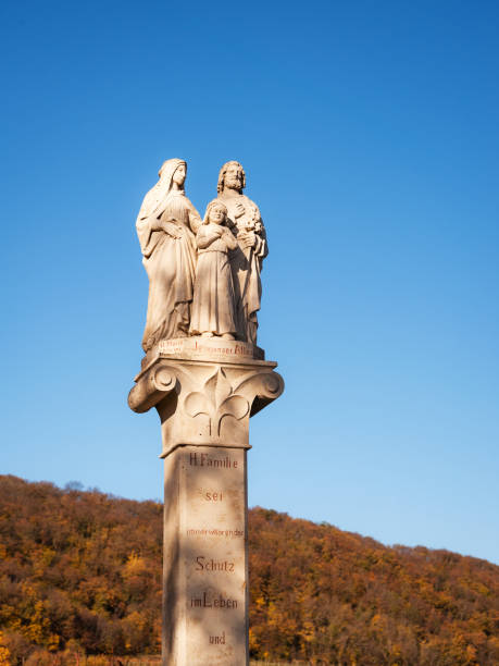 istock Holy family on a religious column 1292563465