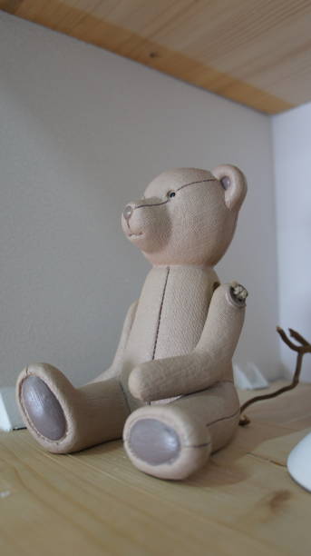 istock Toy bear, souvenir bear on the shelf. 1292564435