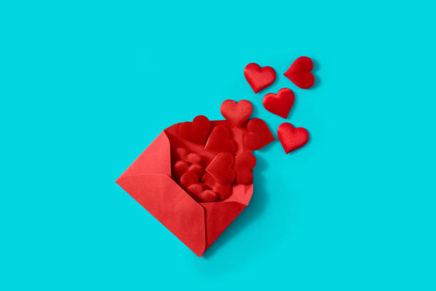 istock Hearts coming out of an red envelope 1292564536