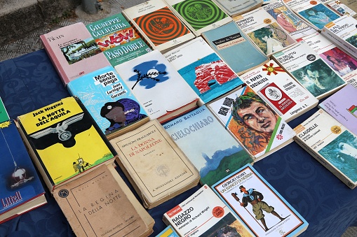 Old book stand at a flea market in Altamura, Italy.