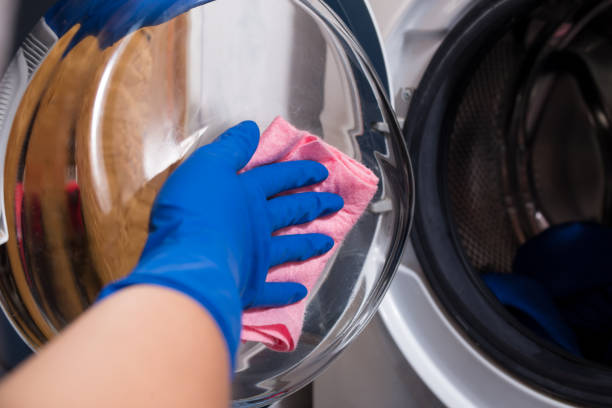 istock Washing machine maintenance. Clean a washer 1292567068