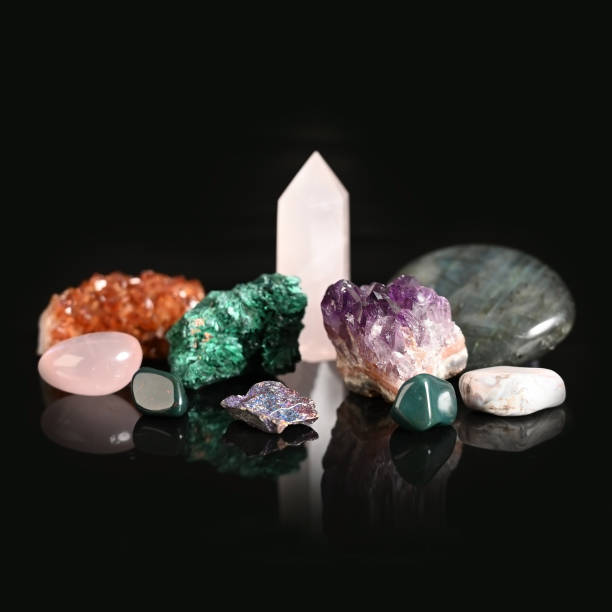 istock Set of semi-precious stones on a black background 1292568027