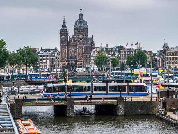 View of the central station with the station square and Saint Nicolas' Church