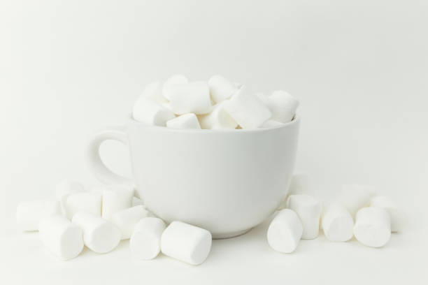 istock Marshmallow in the cup on the white background 1292575364