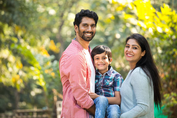 istock Loving parent and son spending leisure time at park 1292575618