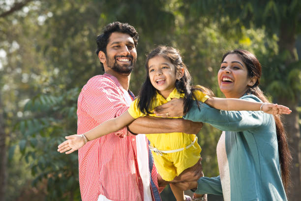 istock Family having fun at park 1292576270