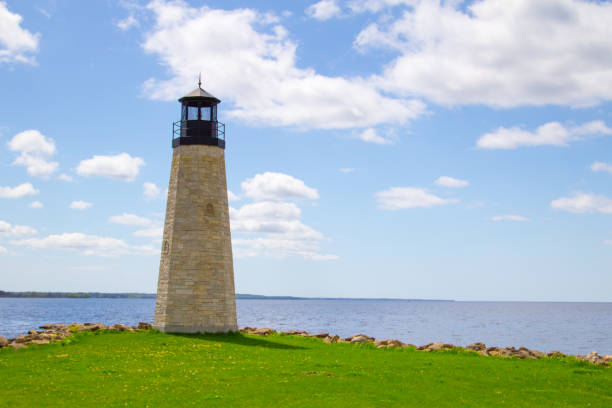Lighthouse On Sunny Day With Copy Space Erected in 2010, the Gladstone Lighthouse is one of the newest lighthouses in Michigan along the Great Lakes coast. gladstone michigan stock pictures, royalty-free photos & images