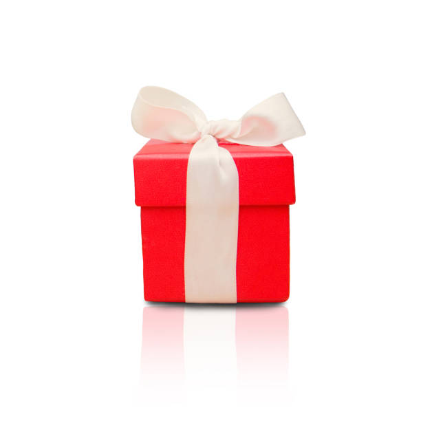 istock Red gift box with white ribbon isolated on white background. Copyspace 1292578486