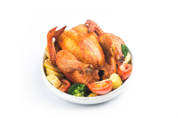 istock roasted chicken and vegetables on wooden table 1292579738