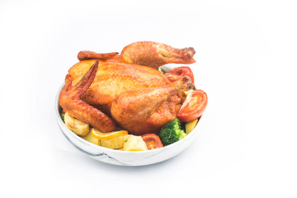istock roasted chicken and vegetables on wooden table 1292580075