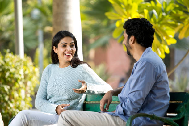 Couple discussing at park