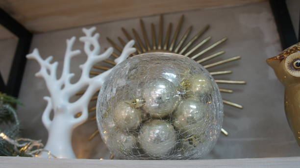 istock Crystal vase with gold balls, interior decoration 1292580229