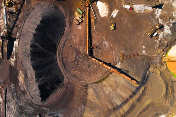 istock Aerial Overhead View of Mining Operations and Equipment and Metal Processing Facility. 1292581876