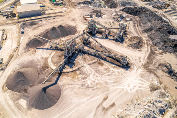istock Aerial Overhead View of Mining Operations and Equipment and Metal Processing Facility. 1292582855