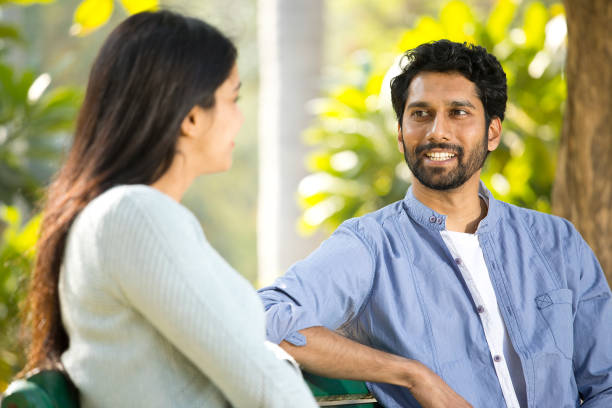 istock Couple discussing at park 1292582856