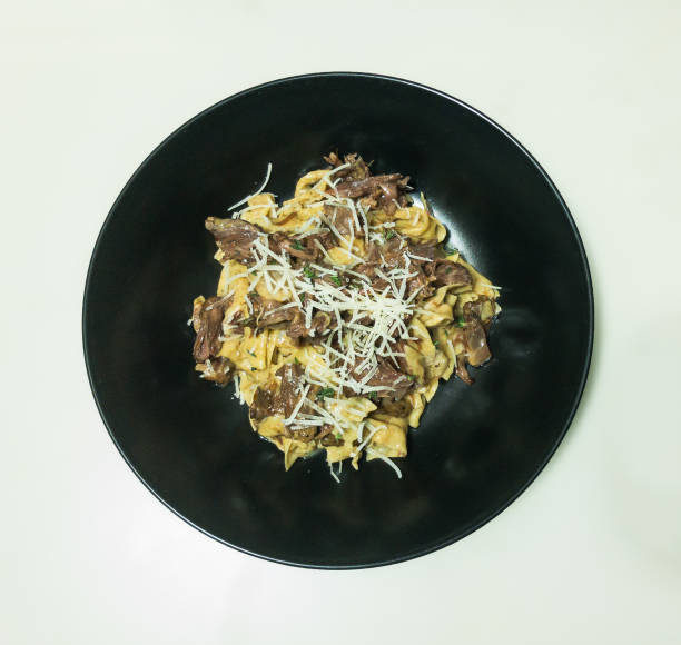 istock Homemade fresh pasta with oxtail, thyme, cheese 1292584030