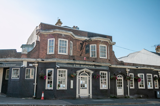 The Hanover Pub & Restaurant in Brighton, England is a commercially run enterprise on Queens Park Road