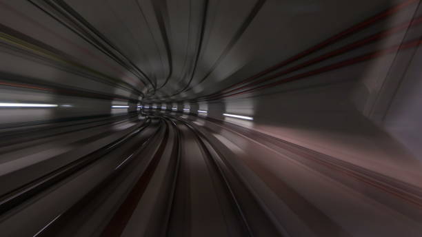 istock Moving in the subway tunnel with light trails inside 1292588408