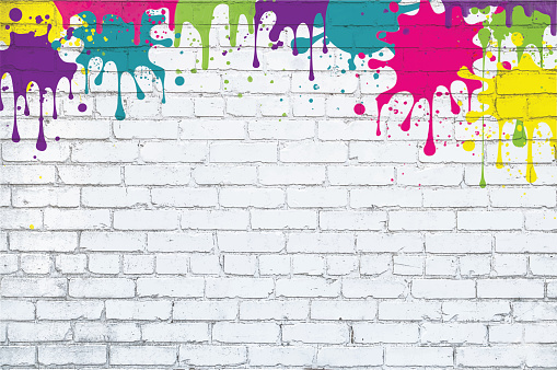 Color paint splash, rainbow spray , multicolored splatter grunge painted white brick wall background. Colorful textured street art backdrop vector illustration with copy space.