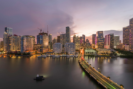 Miami, Florida, USA skyline over Biscayne Bay at dusk.
