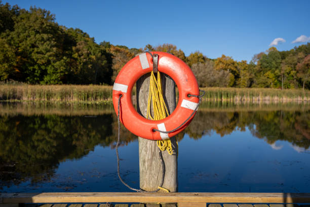 istock Calm Lake Behind Orange Lifesaver 1292589557