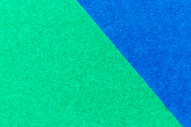 istock Abstract green and blue color paper textured background with copy space for design and decoration 1292590105