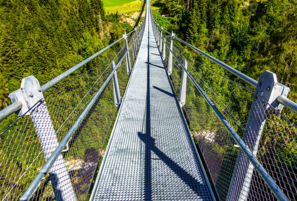 istock new metal bridge at a forest 1292591172