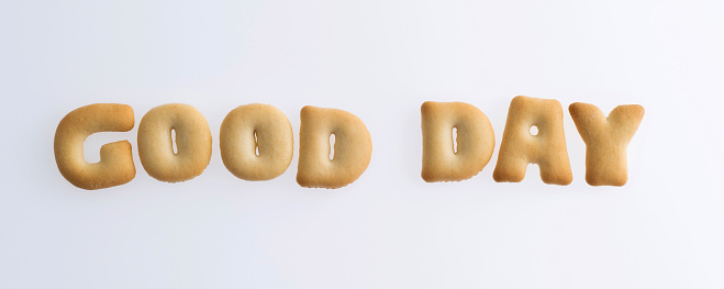 Biscuit text good day on white background.