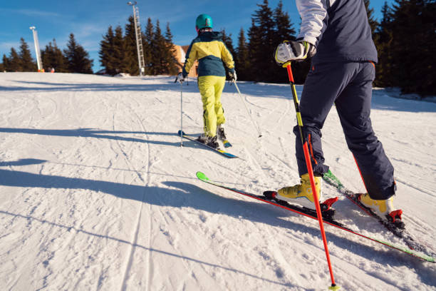 istock Unrecognizable skiers at the ski slope 1292592322