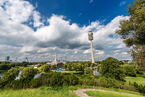 Munich, Germany - Sept 8th, 2018: Panoramic view of the Olympic Park in Munich, Germany (Olympiapark) with the Olympic Tower (Olympiaturm). Bavaria, Germany, Europe. It was built for the 1972 Summer Olympic.