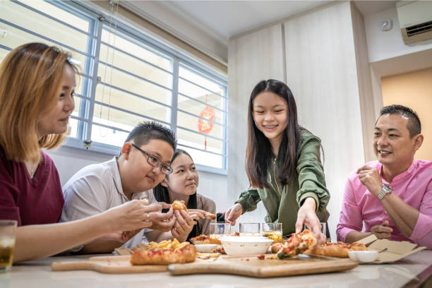 Asian Chinese family having meal time