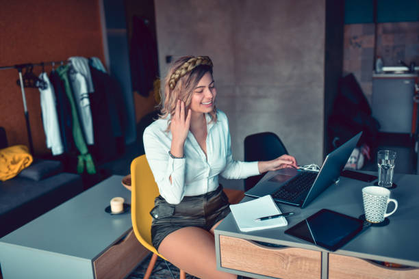 istock Female Beauty With Braid Studying On Laptop At Home 1292596403