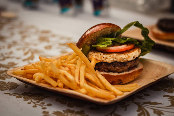 istock burger with fries close-up 1292597115