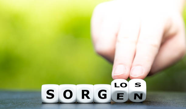istock Hand turns dice and changes the German word 