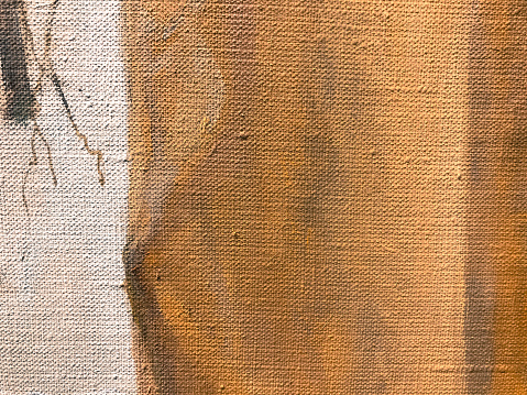 brown, beige, uneven texture. acrylic paint on canvas. palette, paint stains. a mixture of paints with water on a piece of cloth. pussy strokes. the background. volumetric texture on canvas.