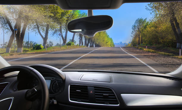 istock highway towards the city lit by the spring sun 1292602519