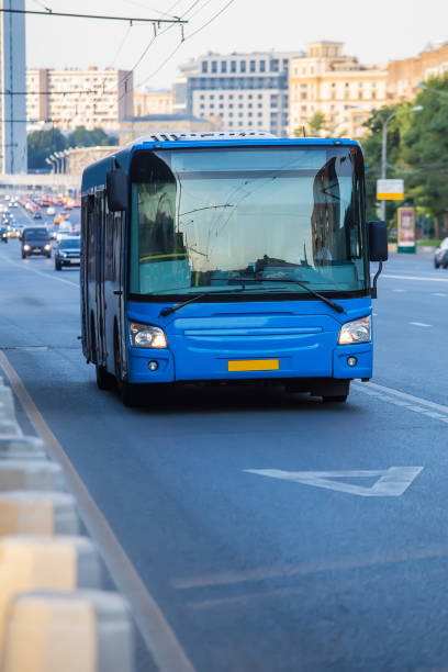 istock city bus moving along the street 1292603210